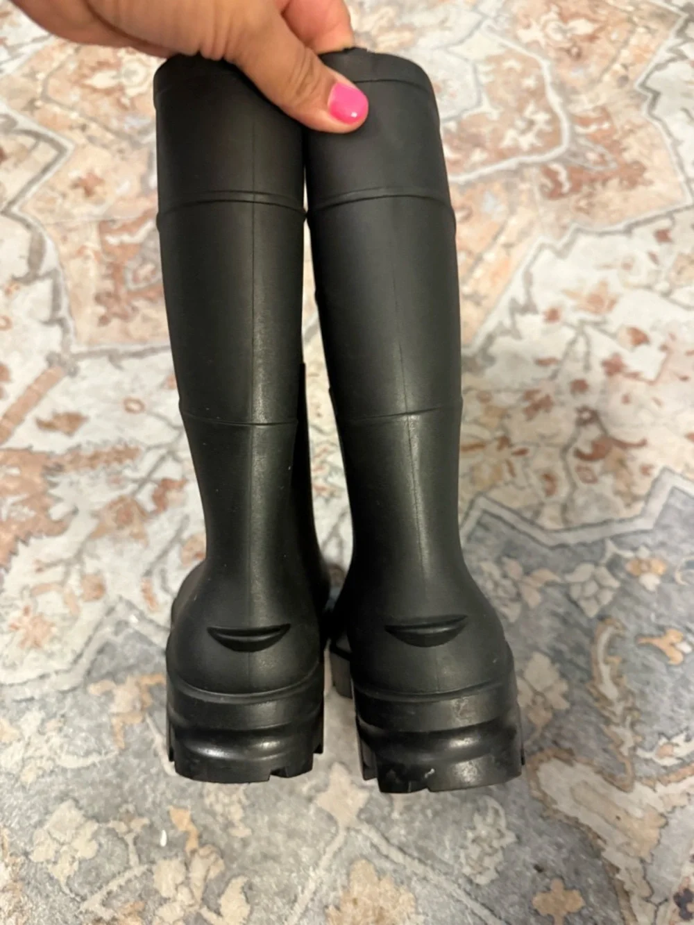 Black rainboots; no brand; men’s size 5
